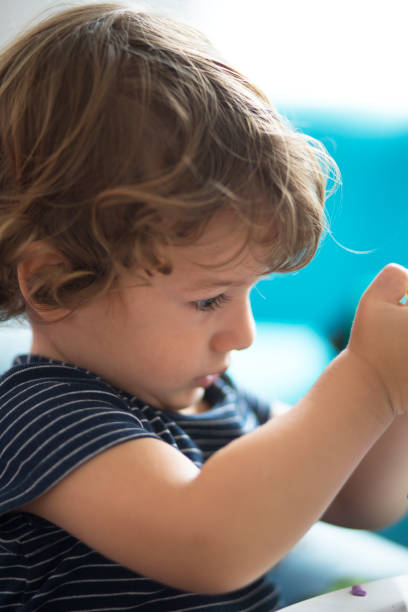 istock cute baby boy is playing 625049020