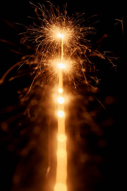istock Line of sparkling lights in darkness 625057168