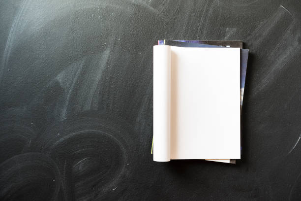 istock Blank folded magazine on top of the heap 625057174