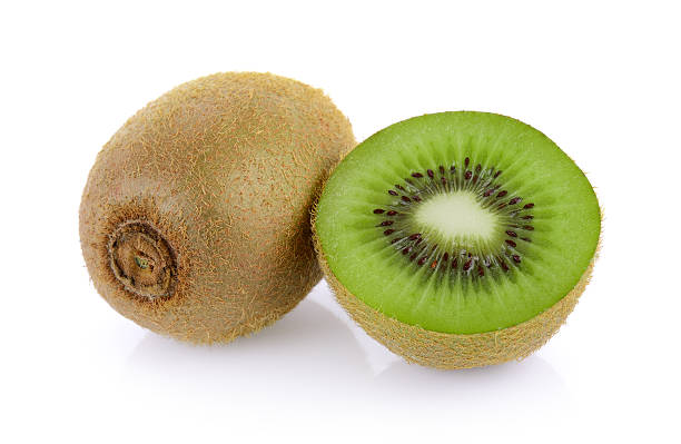 istock Whole kiwi fruit and his sliced segments on white background 625058500