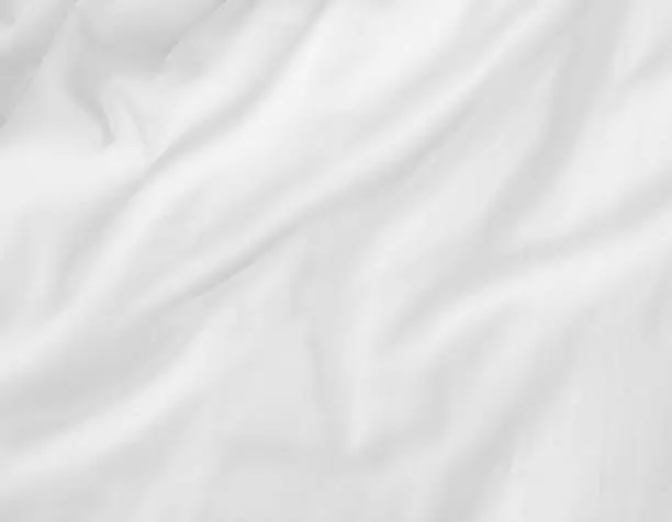 Photo of white bed sheets
