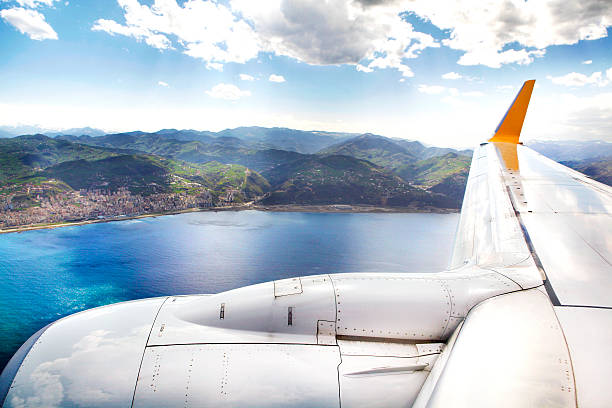 istock Body of an Airplane Flying Above Cloud 625059108
