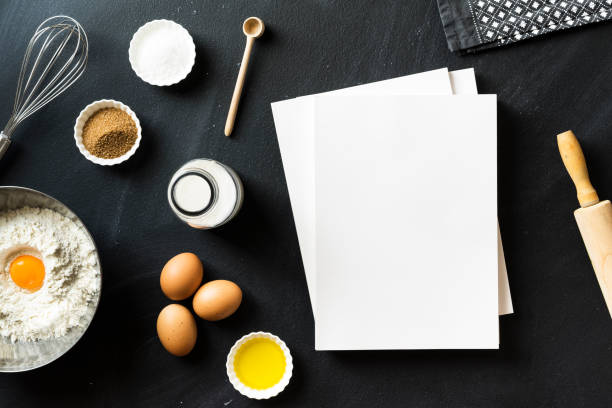 istock Baking recipe, blank white cover magazines on blackboard 625061440
