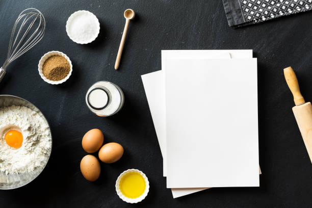 istock Baking recipe, blank white cover magazines on blackboard 625061998