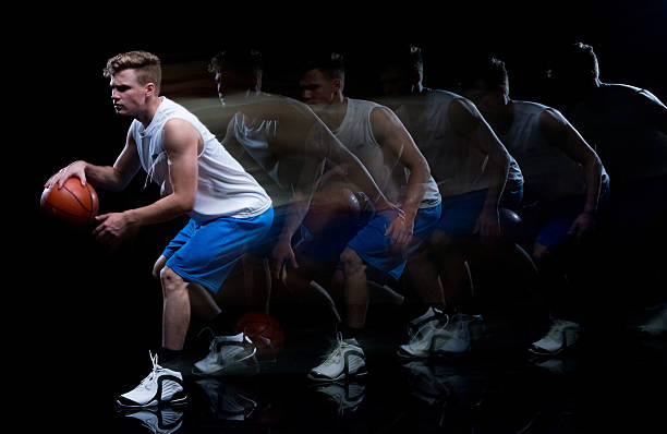 istock Multiple Exposure - Male athlete dribbling 625065282