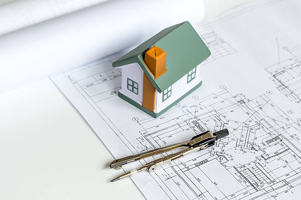 istock architect tools on white background with drawings apartments top view 625068606