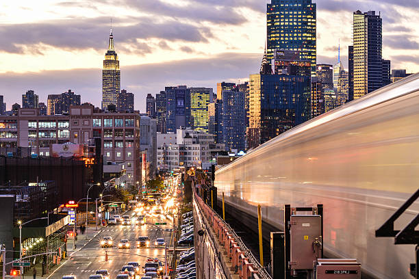 istock Subway train in motion with new york city skyline background 625068720