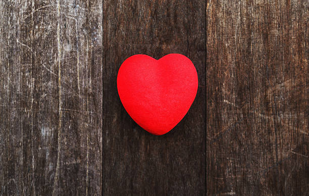 istock red heart on old wood background texture 625068956
