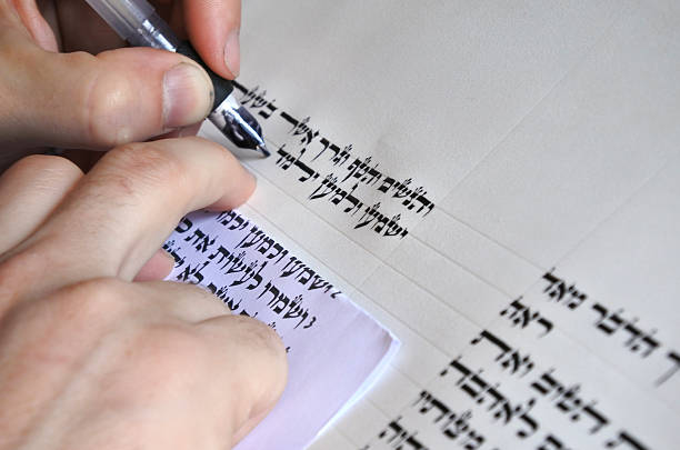 Sofer writes a sefer Torah Hands of Sofer writes a sefer Torah. In the Torah's 613 commandments, the second to last is that every Jew should write a Sefer Torah in their lifetime. stm photos stock pictures, royalty-free photos & images
