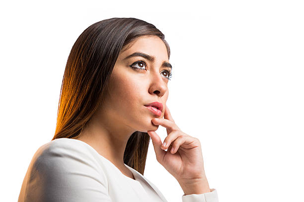 istock Beautiful latin woman thinking and looking up 625070060