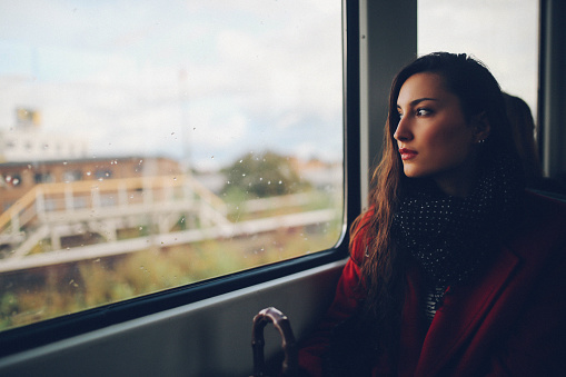 Young woman in Berlin metro train
