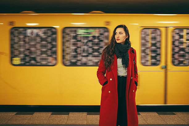 istock Young woman in Berlin subway station 625070242