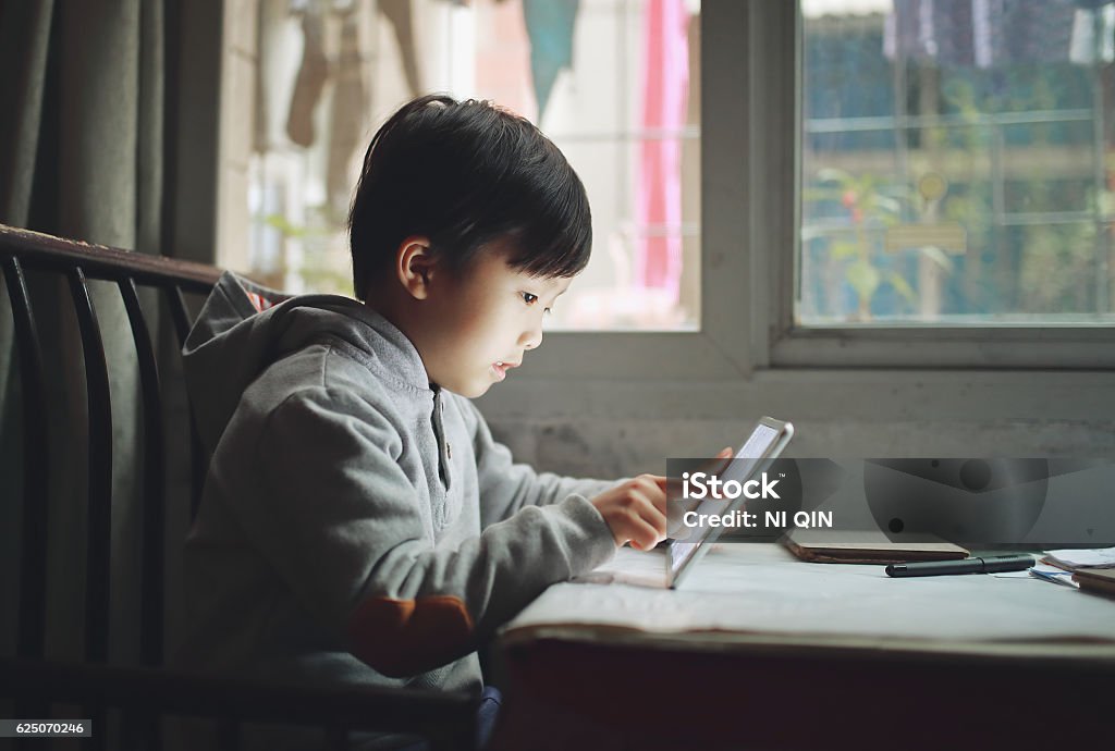 Boy with tablet Daily life of CHinese people Child Stock Photo