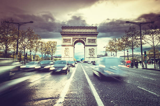 Rush Hour on Avenue Rush Hour on Avenue des Champs-Elysees.Paris. architectural stele stock pictures, royalty-free photos & images