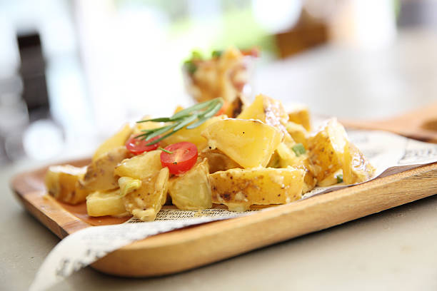 potato salad on wood background