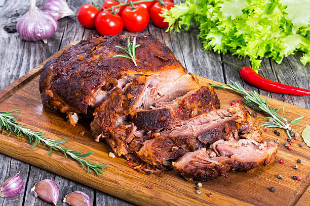 istock Big Piece of Slow Cooked Oven-Barbecued Pulled Pork shoulder 625135910