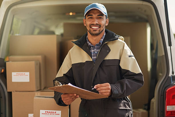 deliveries are right on schedule - postal worker truck driver delivering delivery person imagens e fotografias de stock