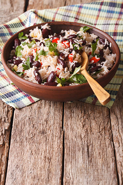 istock Rice with red beans and other vegetables in bowl. vertical 625136364