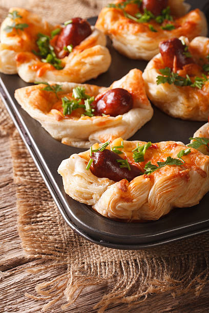 istock puff buns with sausage, cheese and onion macro 625144478
