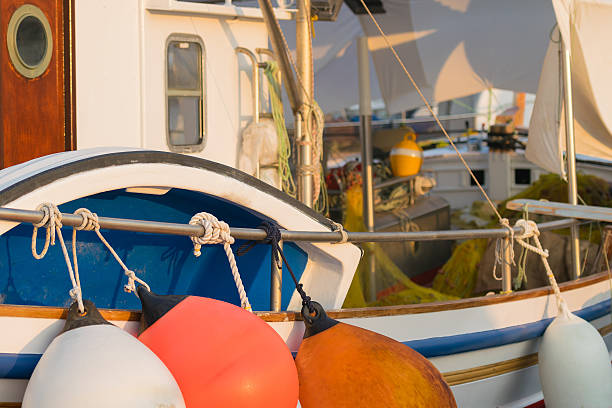 istock Colorful fish boat close up look at Paros. 625144518