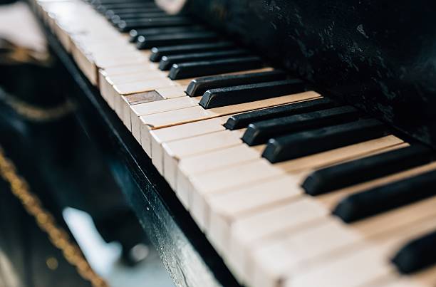 istock Old damaged piano keyboard 625147234