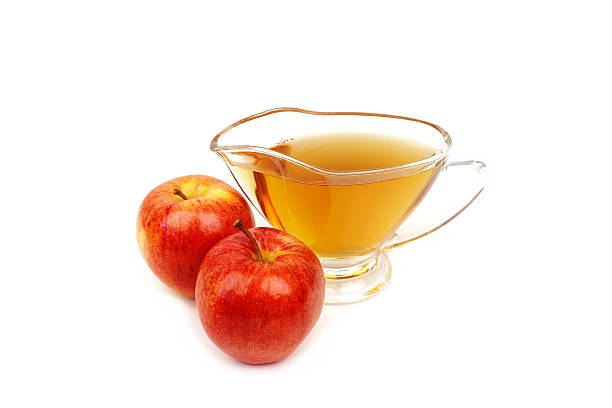 istock Apple vinegar and apples on white background 625157136