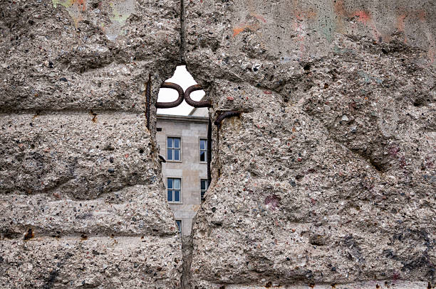 istock hole in the wall provides a look to other side 625167302