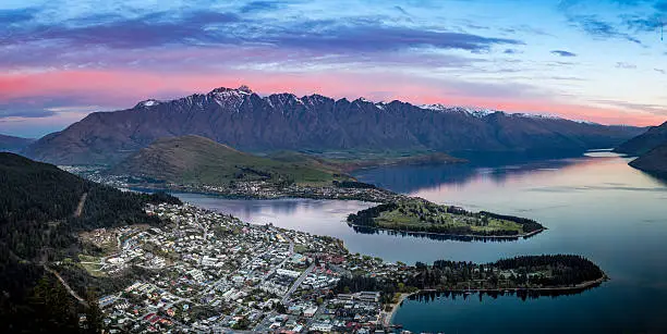 the city of Queenstown, New Zealand at sunset