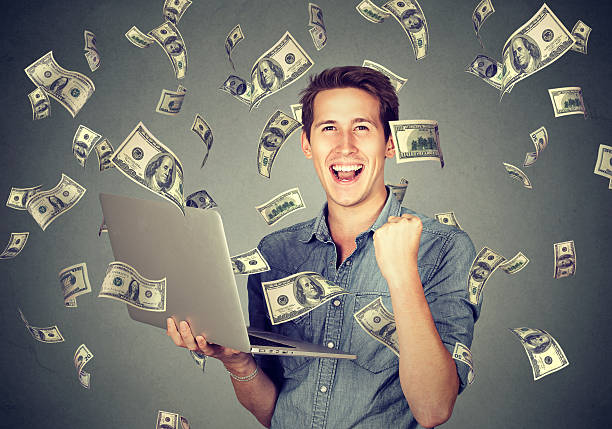 istock Man using laptop building online business making money 625188730