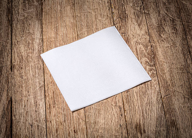 istock napkin on old wooden table 625189036