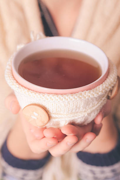Woman with cup of tea