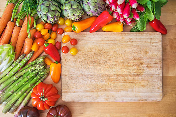 istock Organic vegetables on wooden table 625190678
