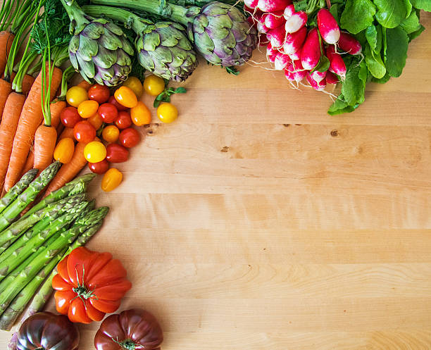 istock Organic vegetables on wooden table 625191112