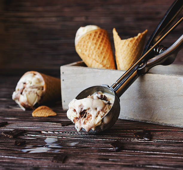 istock chocolate ice cream in a sugar waffle cones, selective focus 625192330