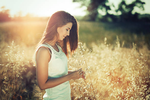 istock Beautiful carefree woman in fields 625192850