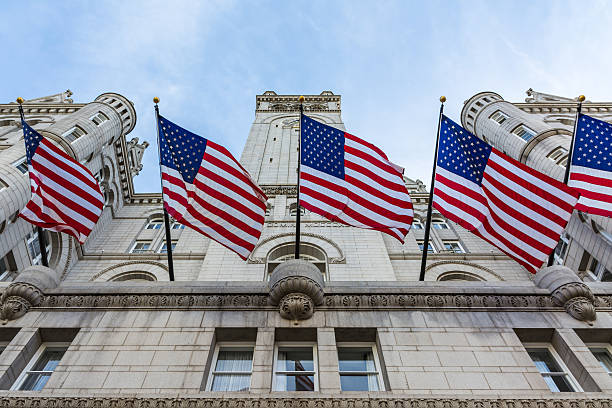 Donald Trump Hotel Washington DC Facade Exterior Entrance Lookin Washington D.C., USA - November 8, 2016: Donald Trump Hotel Washington DC Facade Exterior Entrance Looking Up November 2016 donald trump stock pictures, royalty-free photos & images