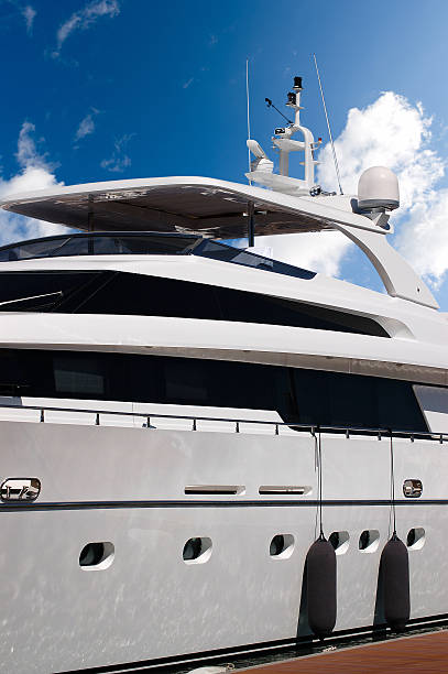 istock Luxury Yacht on Blue Sky with Clouds 625195478