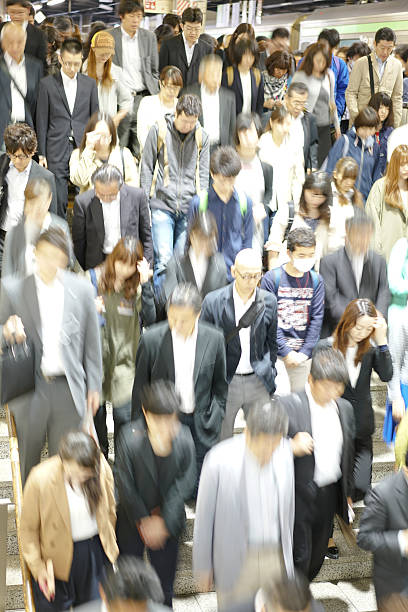 istock Crowd on escalator at Sapporo train station on Hokkaido, Japan 625202272