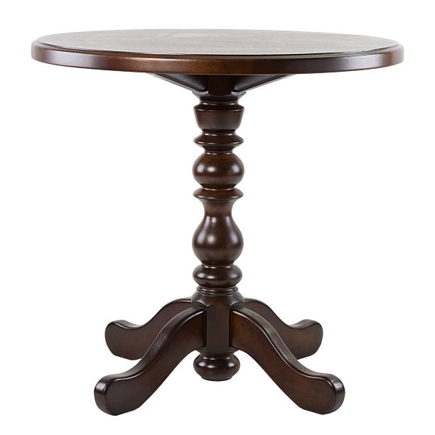 istock Brown wooden round table isolated on white background. 625202574