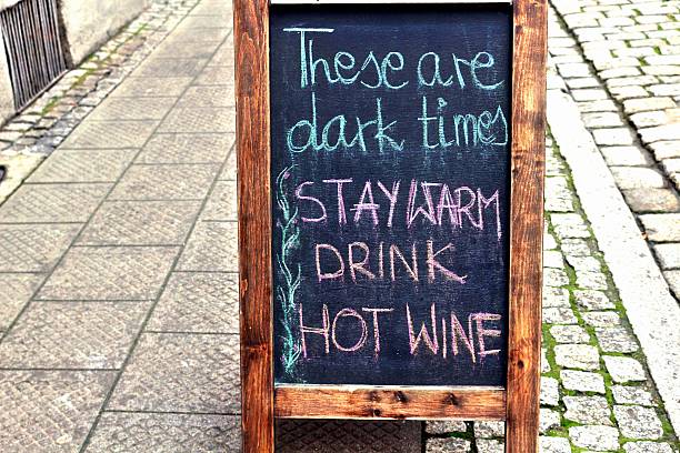 istock These are dark times. Stay warm. Drink hot wine. 625203230