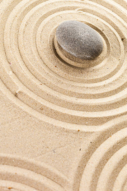 istock zen garden meditation stone background 625217720