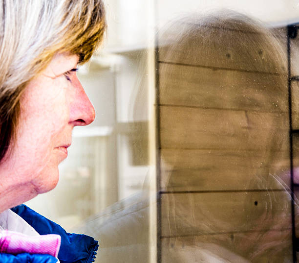 istock senior woman window shopping 625221504