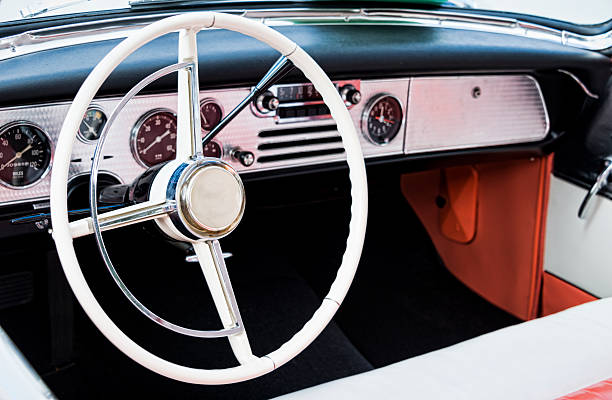 istock Steering wheel and interior of a classic car. 625222424