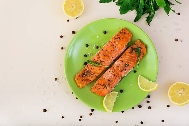 istock Baked salmon with spices. Top view 625230186