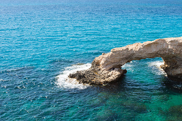 istock Stone cliff in a beautiful blue sea Cyprus 625230354