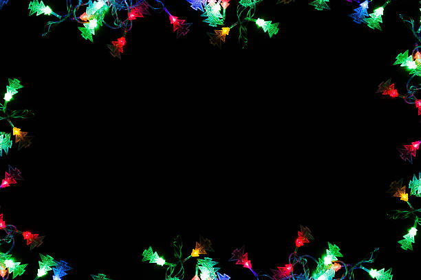istock christmas lights border on black background 625230506