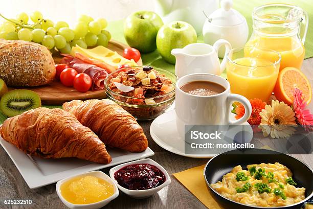 Breakfast Served With Coffee Juice Egg And Rolls Stock Photo - Download Image Now