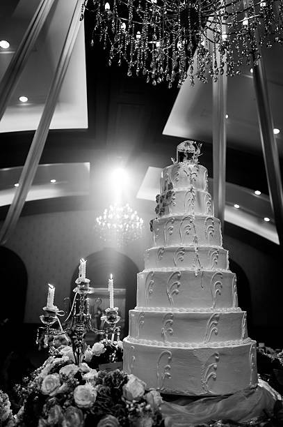 istock Wedding cake and candle with flower decorate 625233290