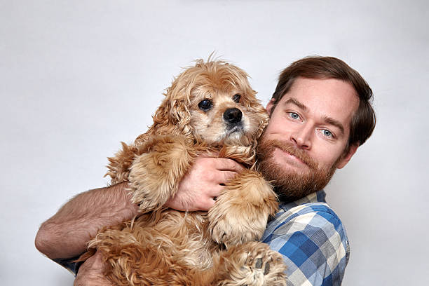 istock Smiling man hugging dog - best friends ever 625233630