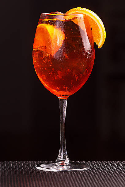 istock Spritz in glass, close up on black background 625234576